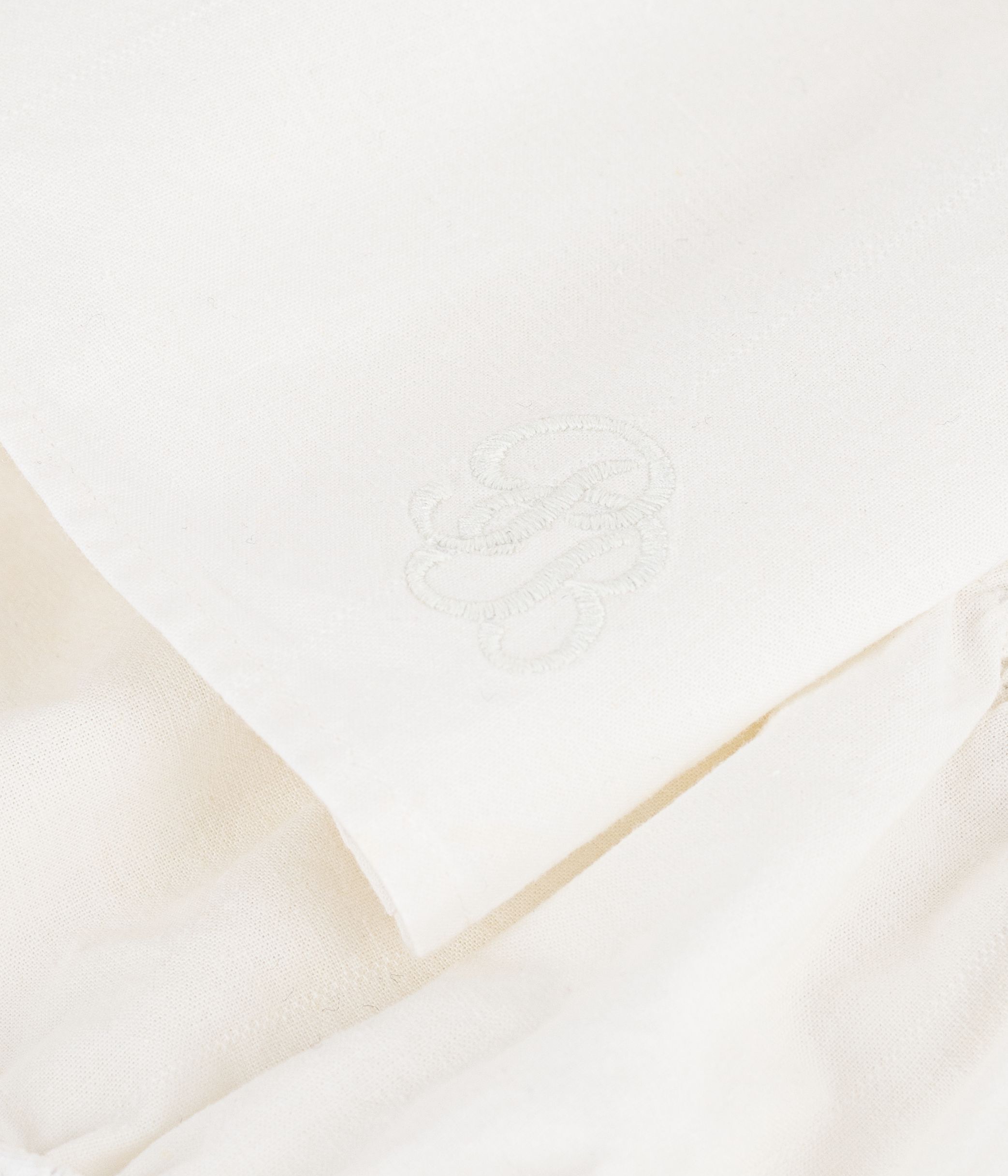 Cotton/linen baby dress with matching bloomers, with embroidered detail