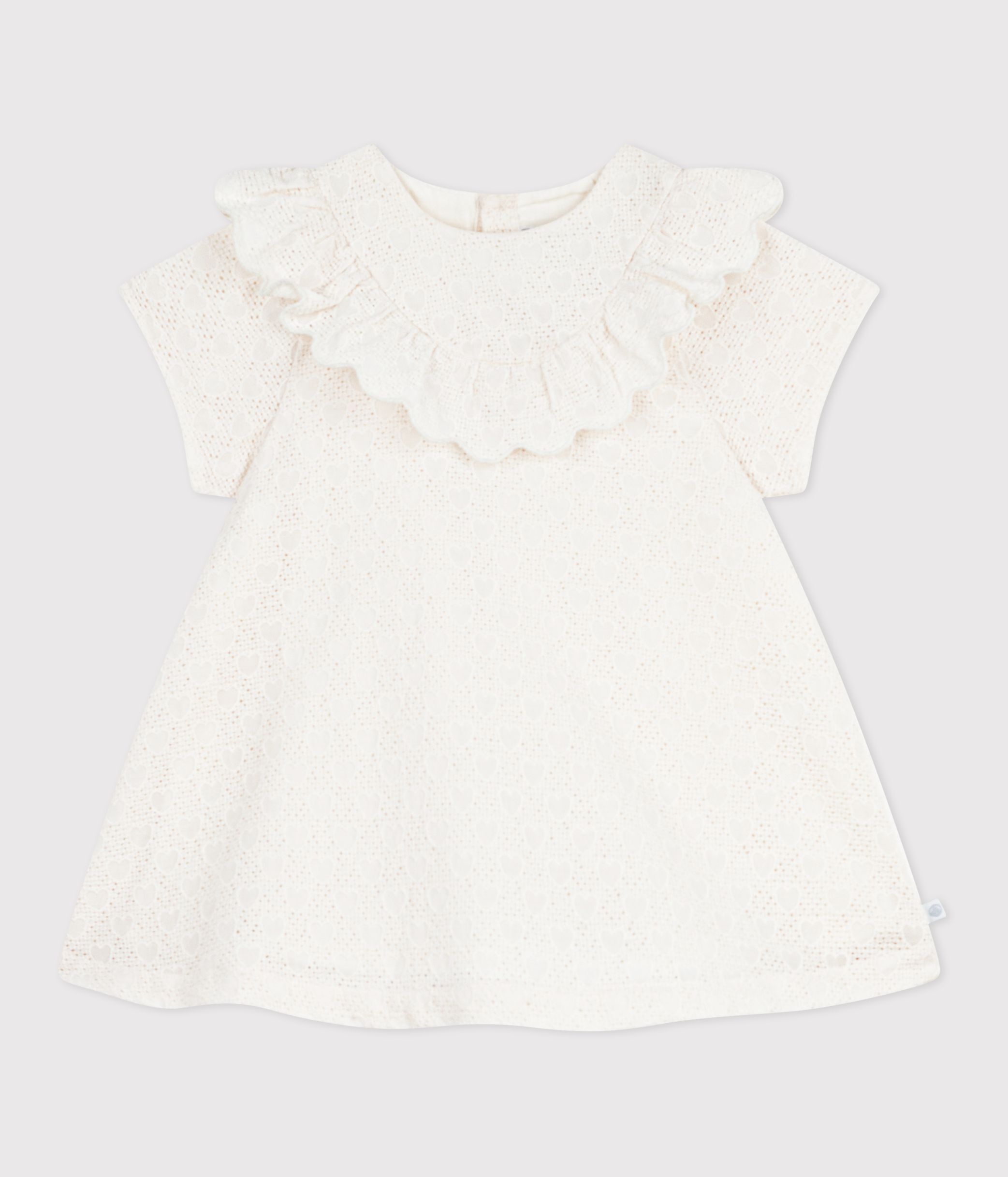 Babies' dress in broderie anglaise with short sleeves and a hearts motif