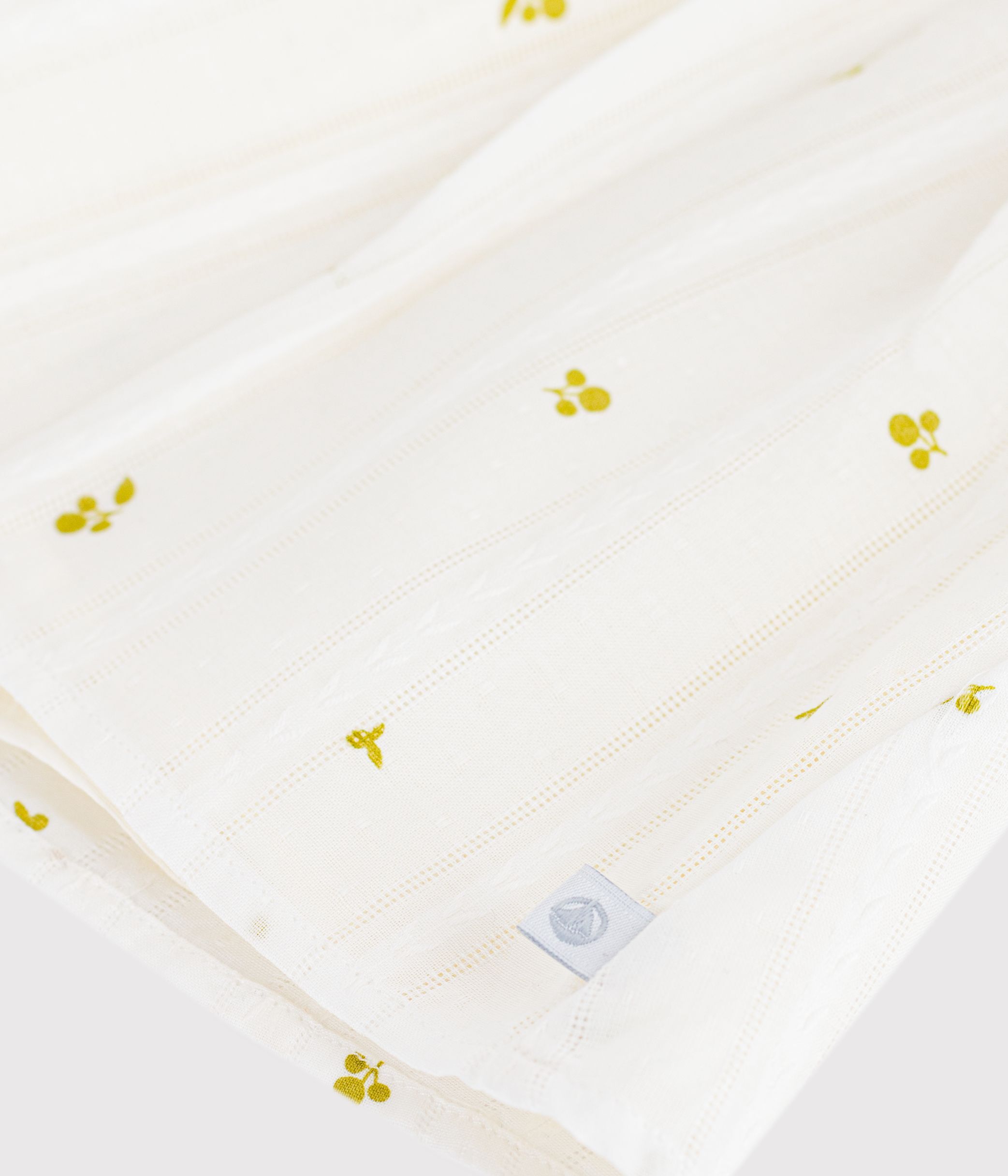 Babies' sleeveless cotton blouse with a floral print