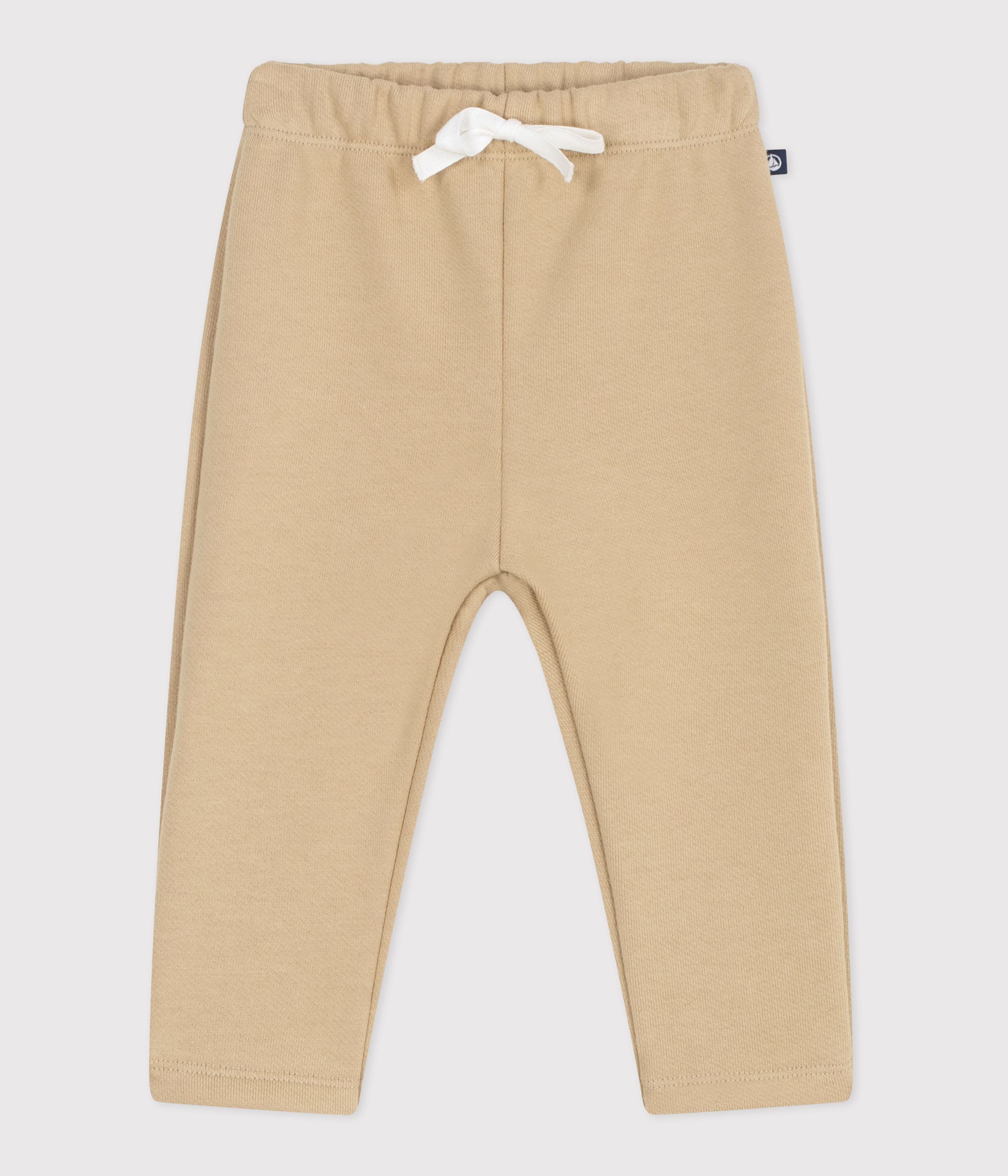 Babies' jogging bottoms in plain cotton